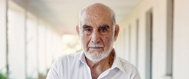 Portrait of an elderly man with myelofibrosis, symbolizing the resilience and determination of patients in the face of cancer